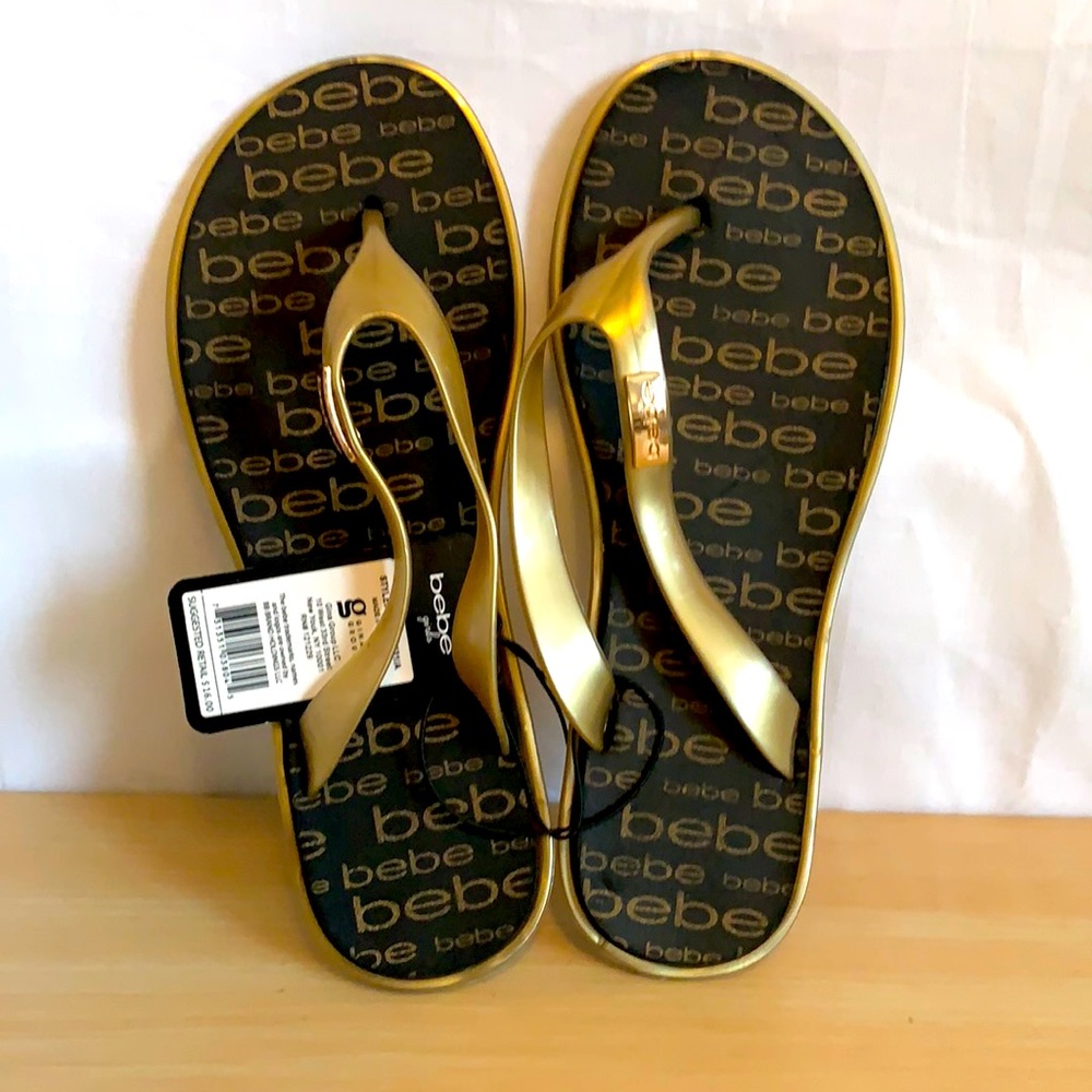 Black & gold size 2/3 Bebe flip flop sandals